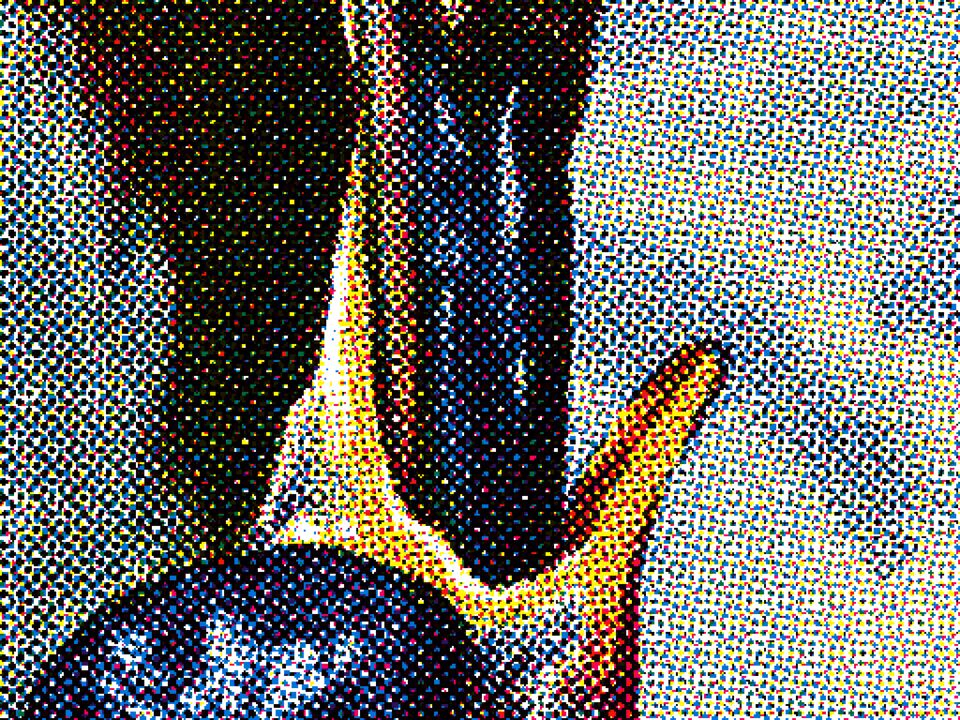 Extreme closeup of a printed Post Pluviam showing its halftone pattern
